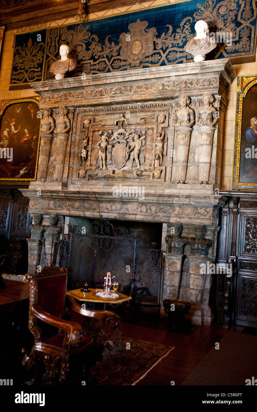 Sitting area with ornate fireplace, Hearst Castle, San Simeon, California, United States of America Stock Photo