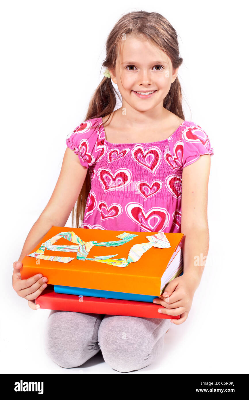 eight year old girl reading a book Stock Photo Alamy