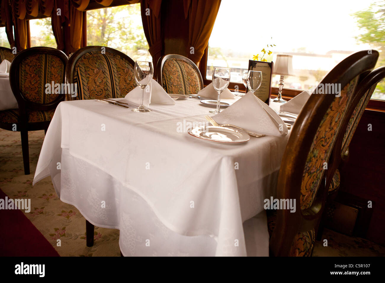 Interior of a dining car, set for lunch, Napa Valley Wine Train, Napa, California, United States of America Stock Photo