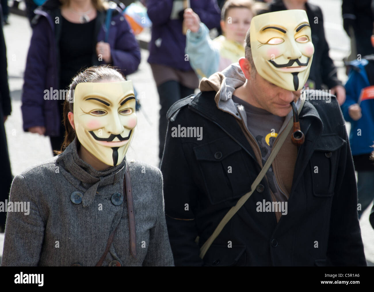 V for Vendetta masks on 2 marchers at G20 March in London on 28th March 2009 Stock Photo