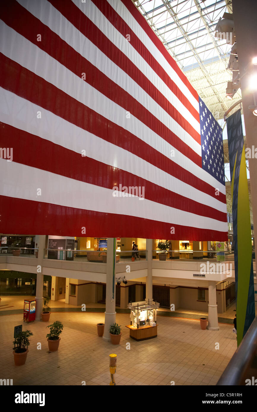 huge us american flag hanging in a shopping hickory hollow mall in Nashville Tennessee USA Stock Photo