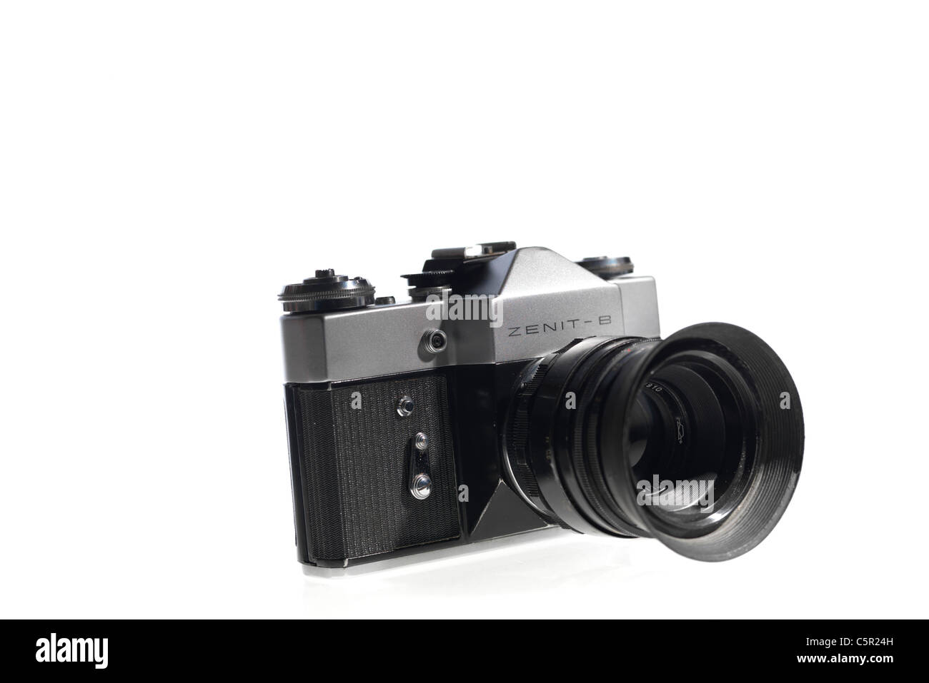 Old fashioned 'retro' Soviet era Zenith 35mm camera on white background ...