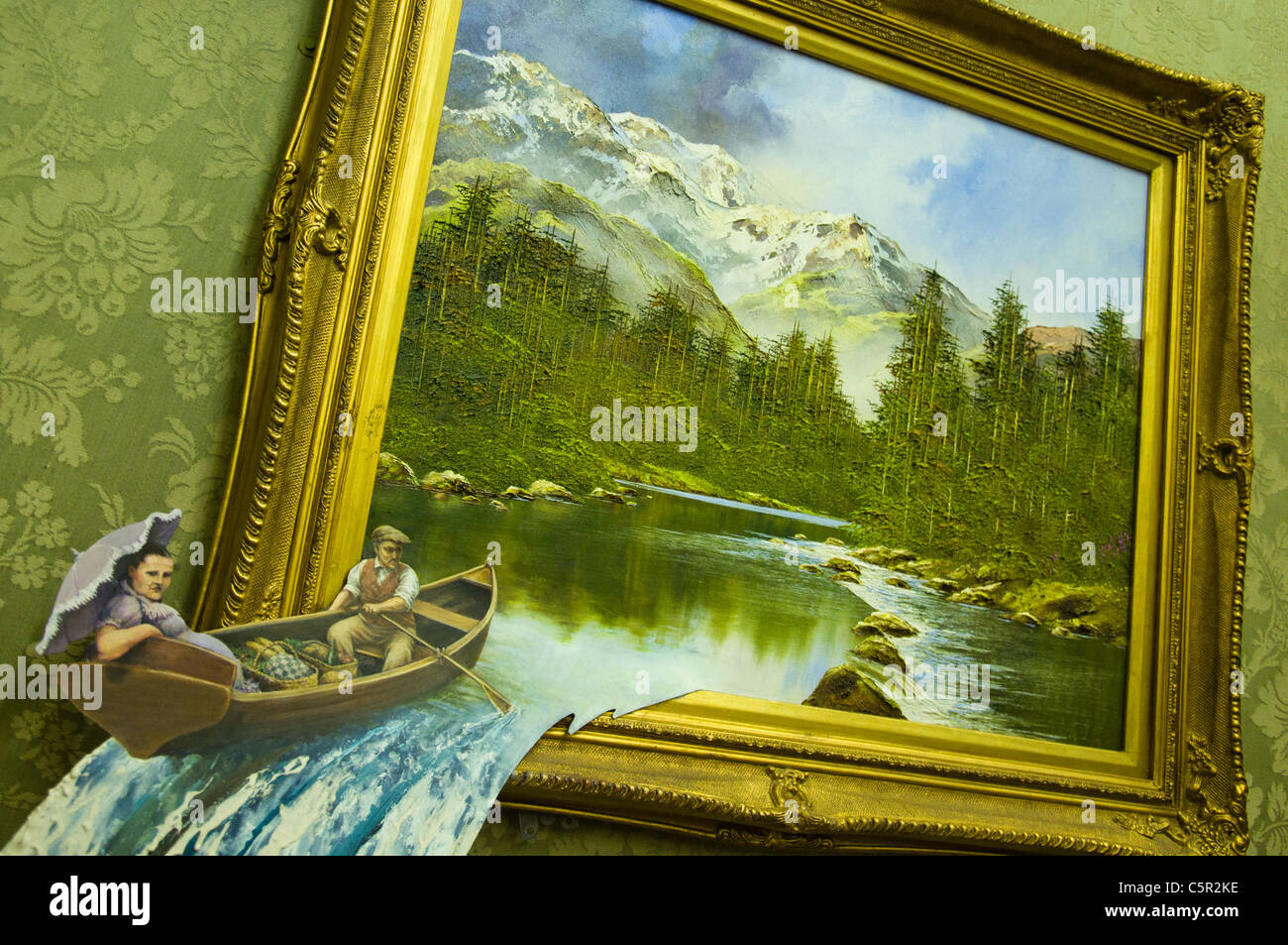 Banksy painting of a river scene with couple in boat falling out of the picture in a waterfall Stock Photo