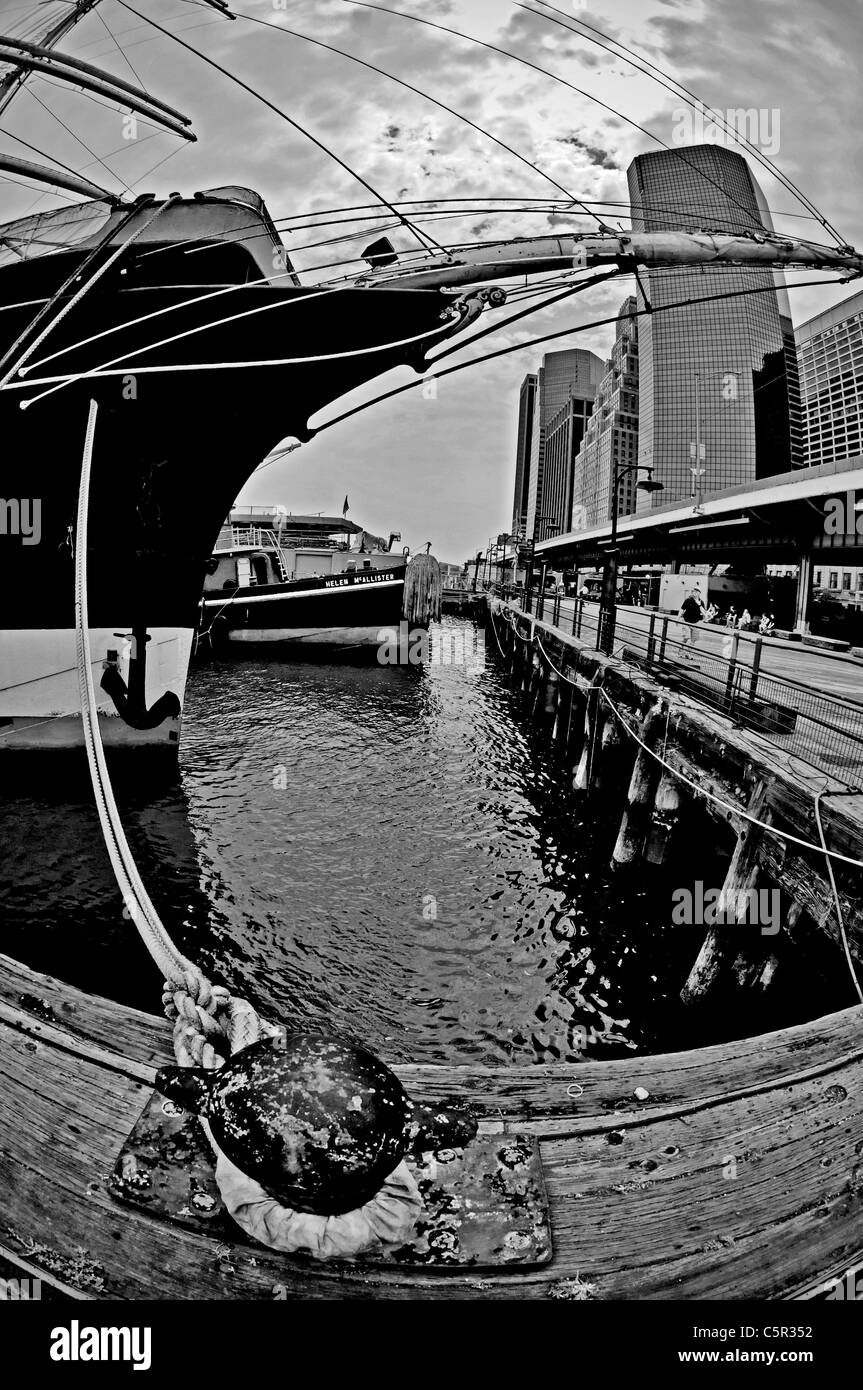 Old sailing ship moored with  rope, South Street Seaport, Manhattan, New York, NY, USA Stock Photo