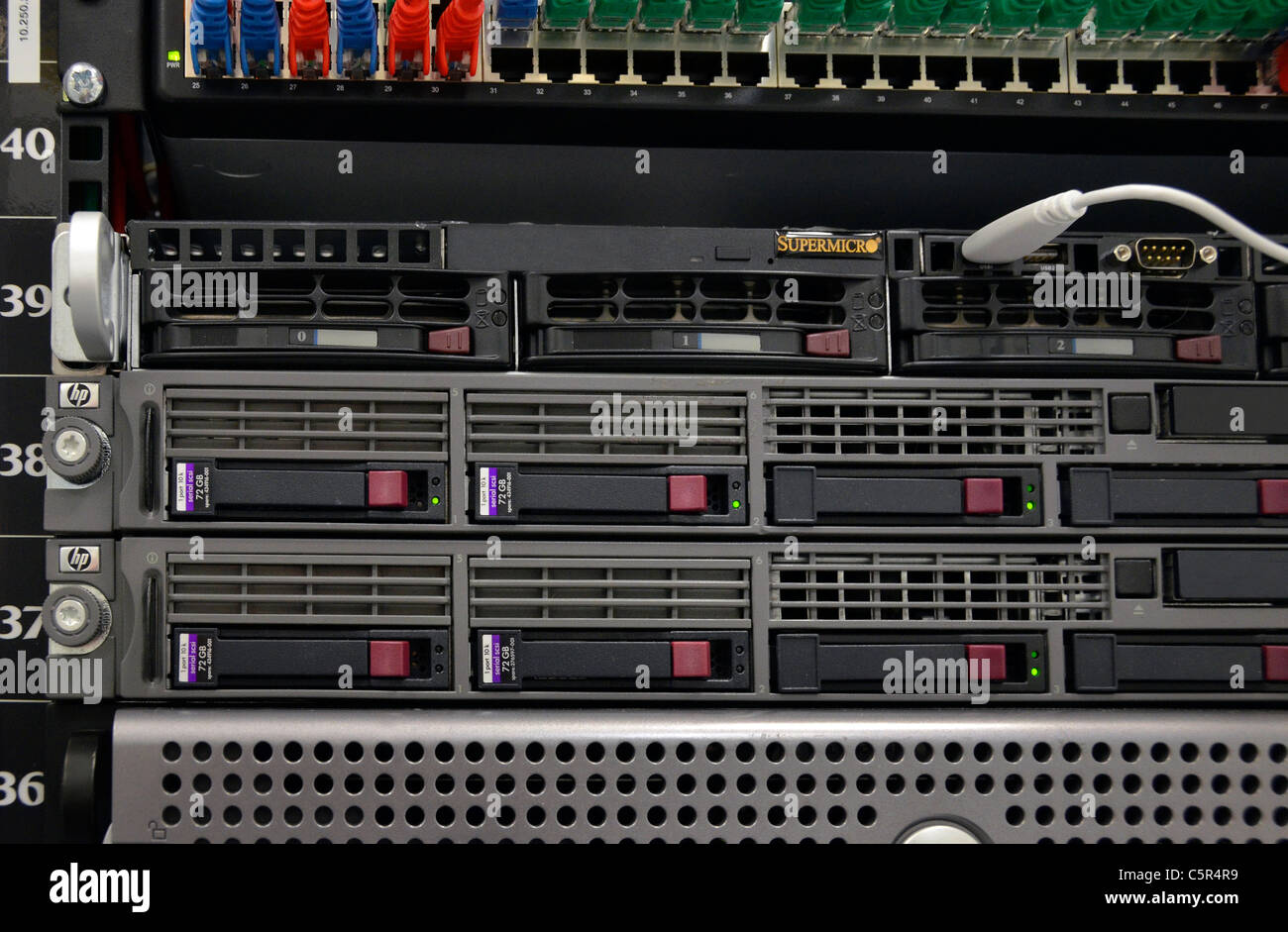 HP Proliant and Dell servers racked in computer server room