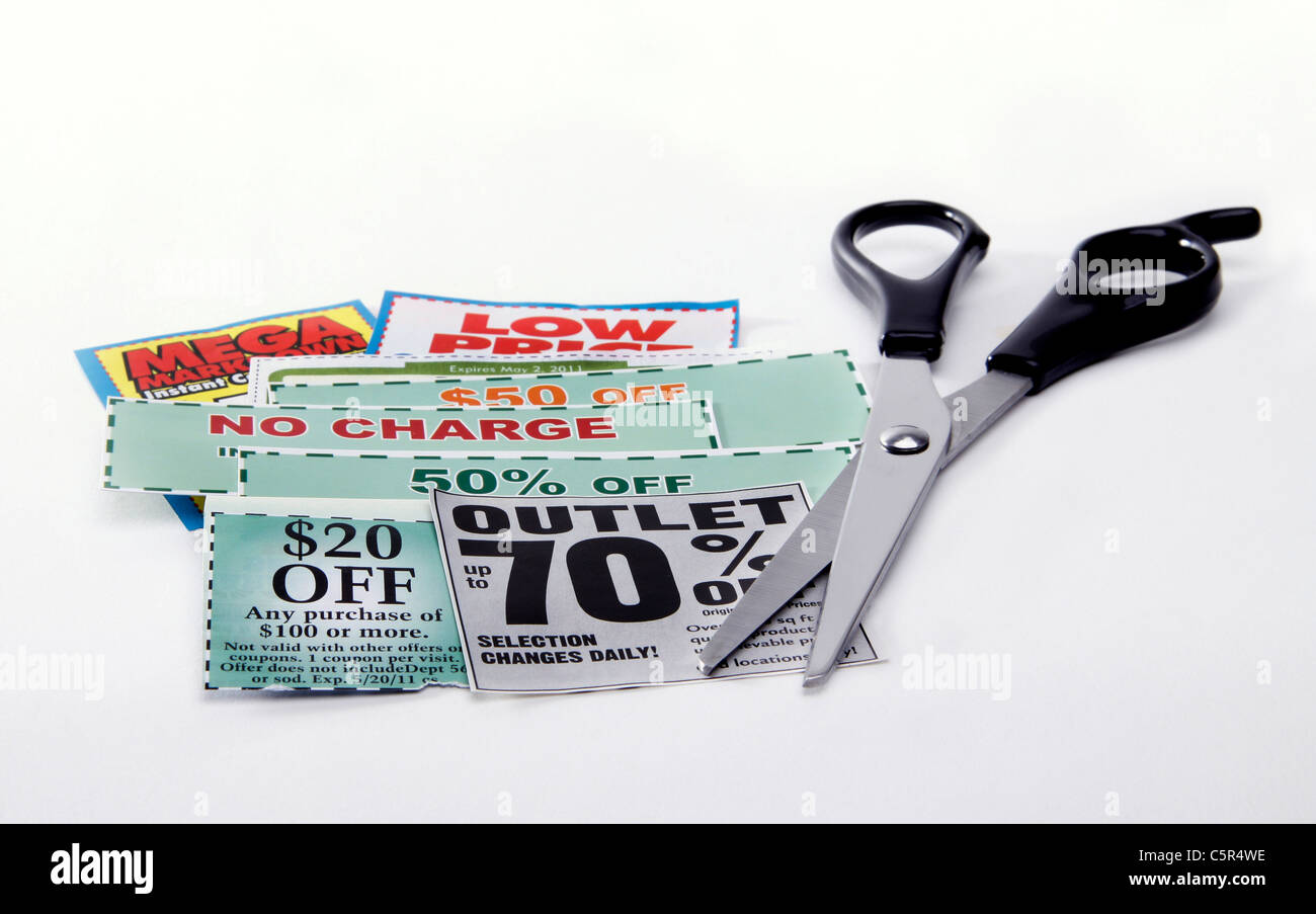 Coupons and scissors Stock Photo