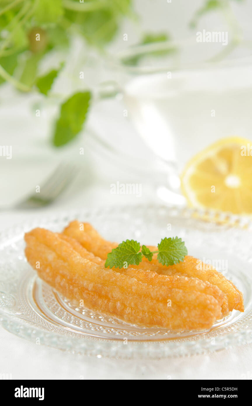 Traditional balkan dessert made of deep-fried uleavened dough poured with syrup Stock Photo
