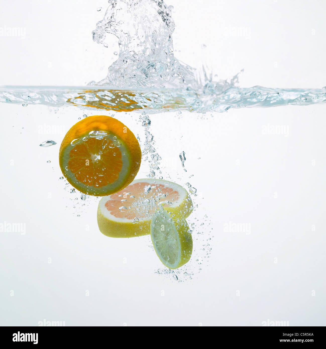 Slices of oranges in water Stock Photo Alamy