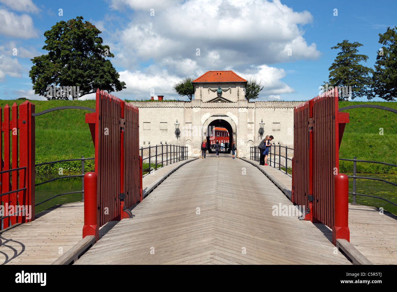 Historic gate and entrance over the bridge of the moat to Kastellet - the Citadel fortification in Copenhagen, Denmark. Stock Photo