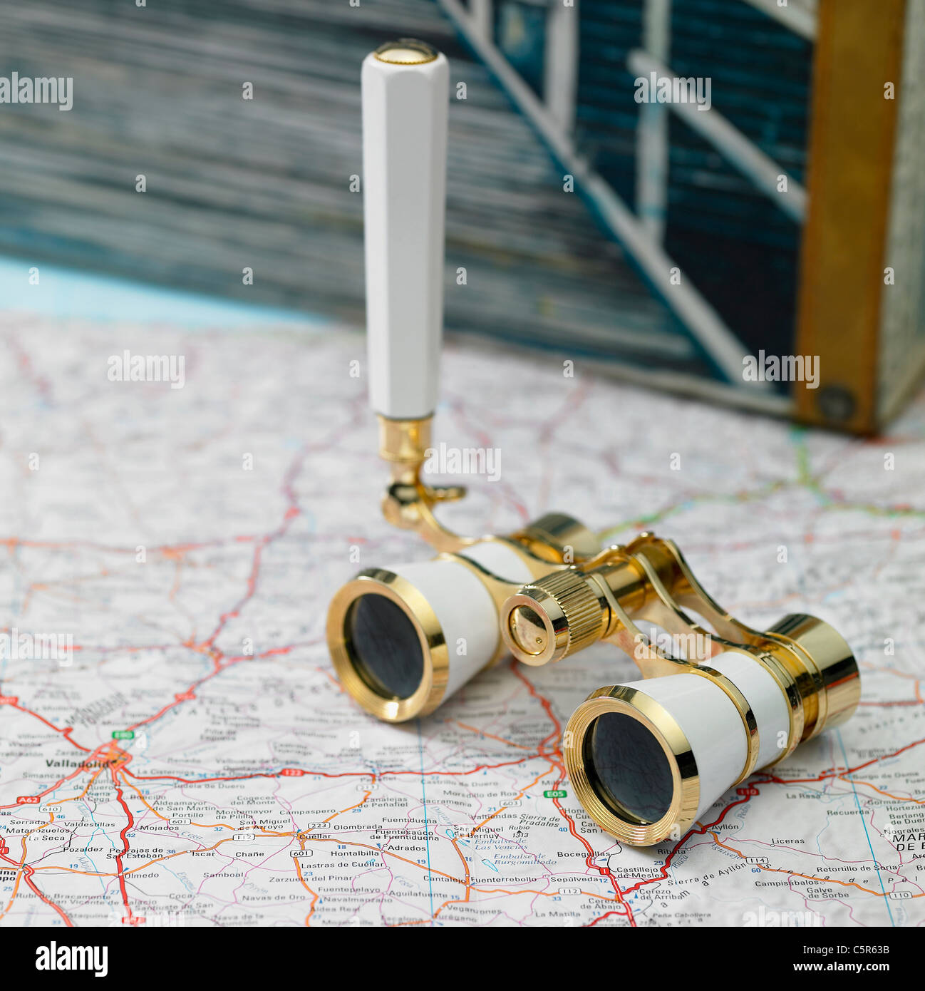 Binoculars on a map Stock Photo Alamy
