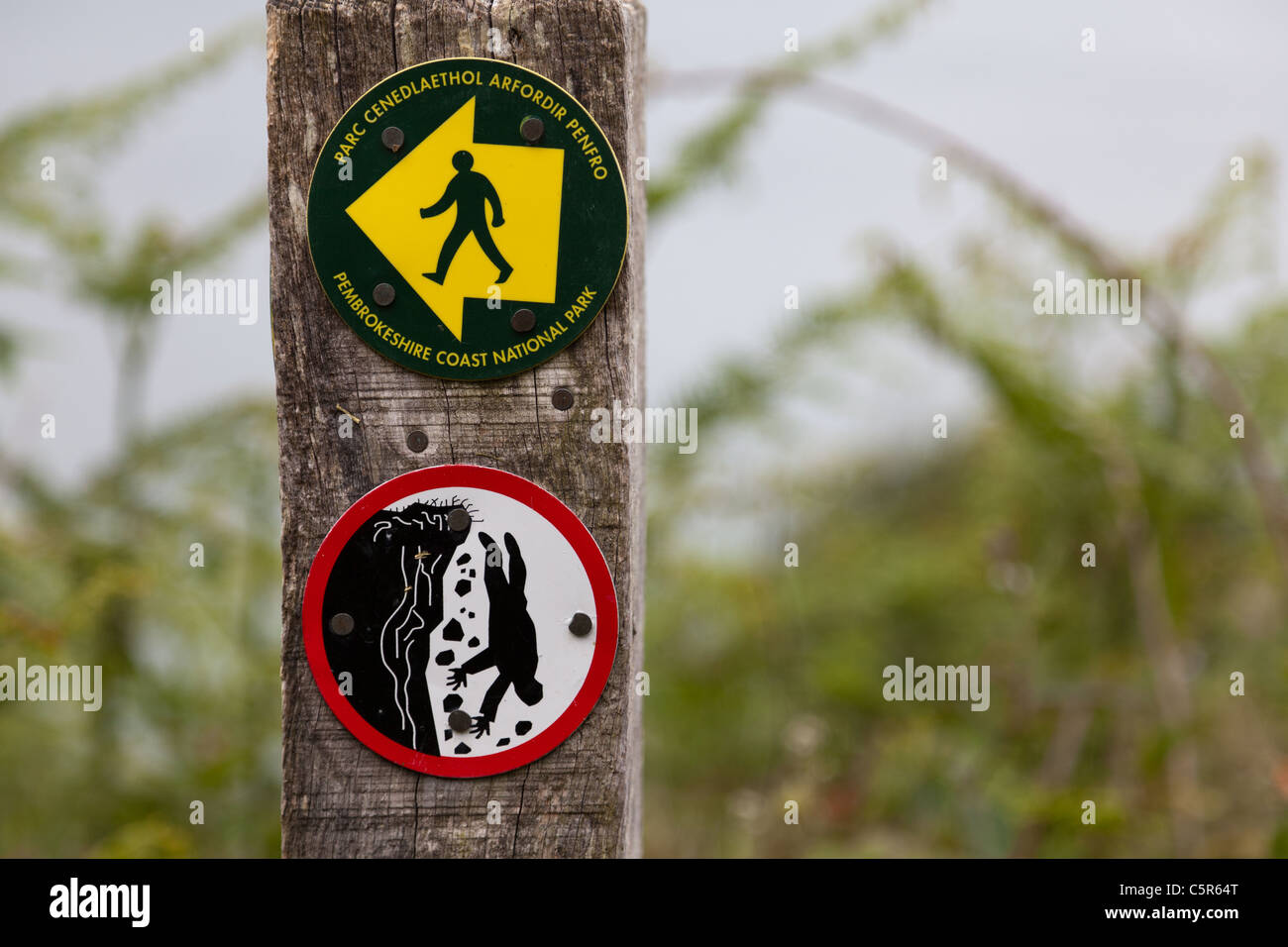 Danger warning signs on the Pembrokshire Coast National Park Stock
