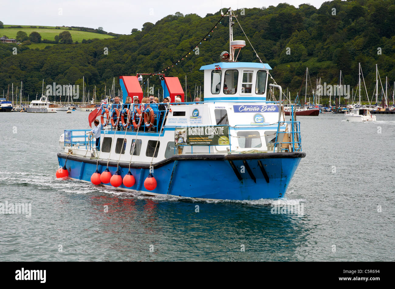 Greenway ferry on the River Dart close to Dartmouth, Devon and proceeding downsteam from
