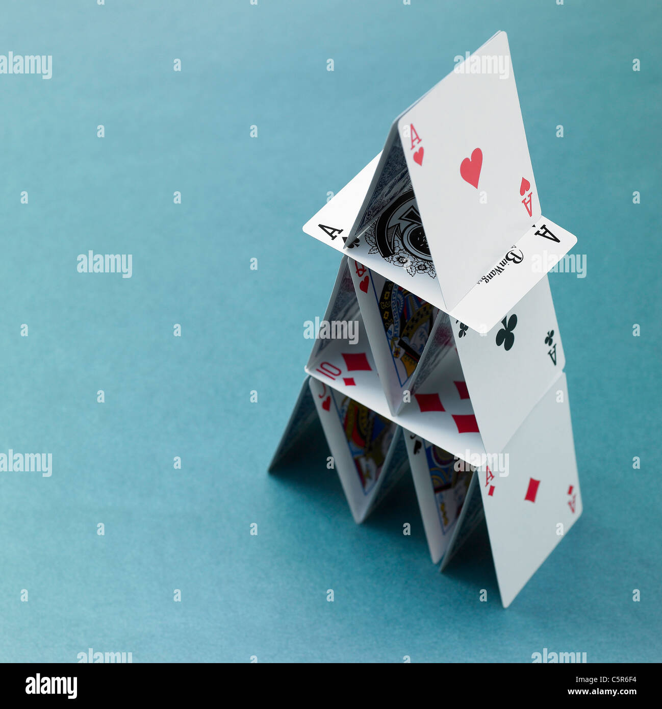 Pyramid made of playing cards Stock Photo