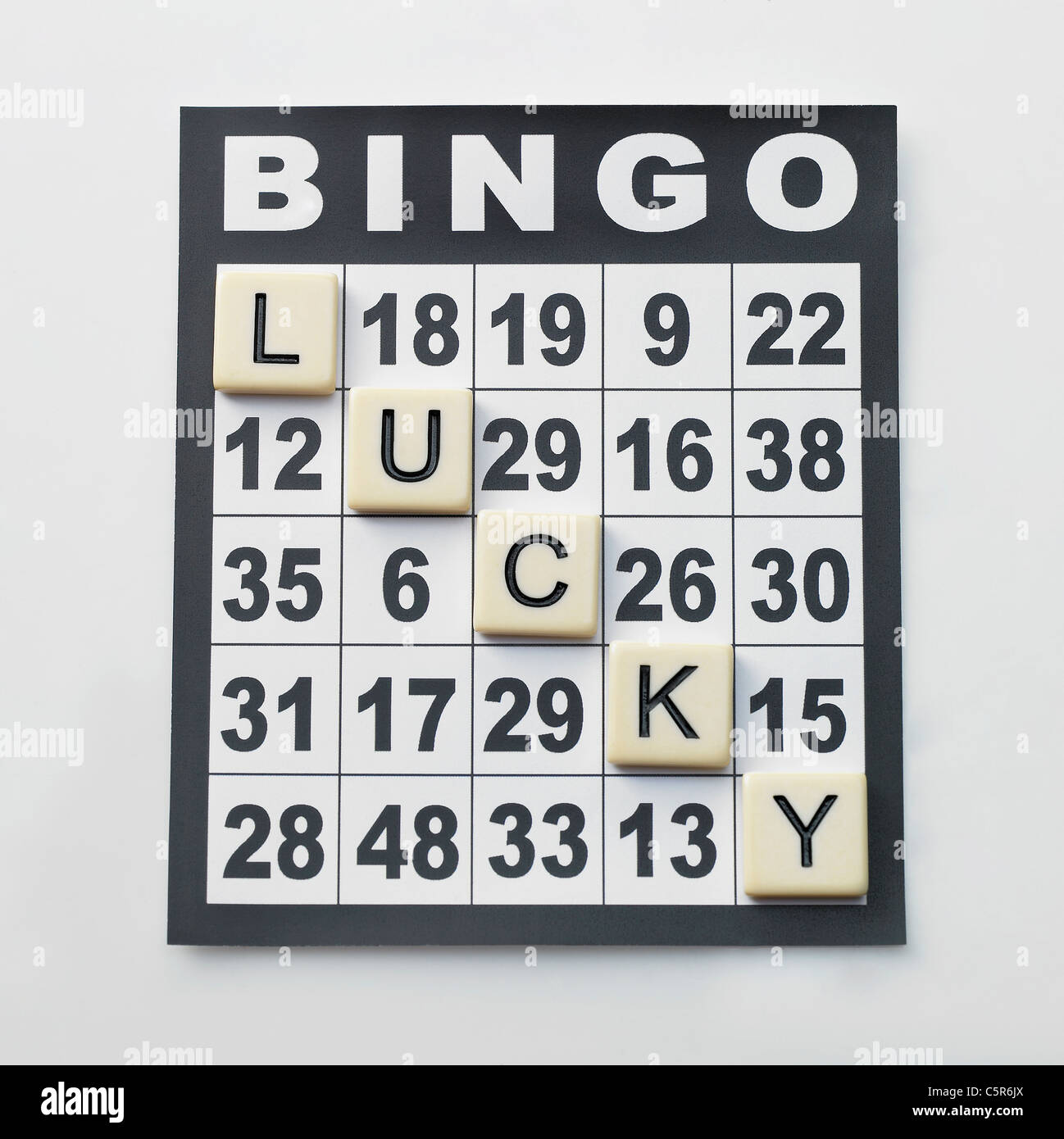 Bingo card and letter blocks Stock Photo Alamy