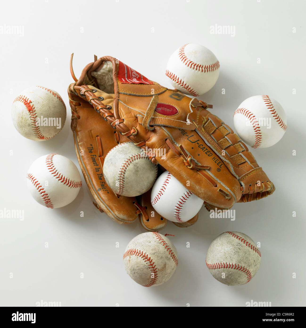 Baseball gloves and balls Stock Photo Alamy