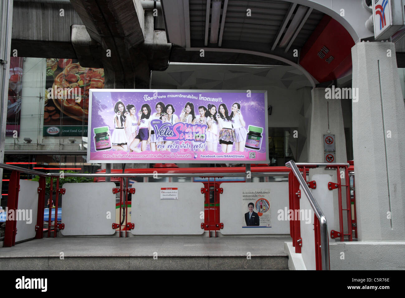 Advertisement screen in BTS station in Bangkok Stock Photo - Alamy