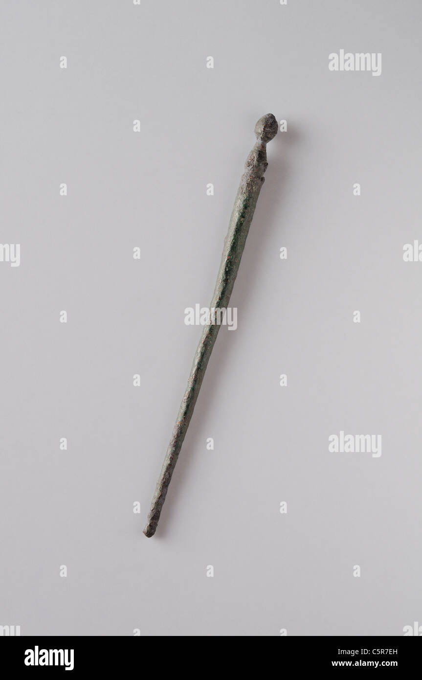 Hair needle in bronze. Length 81 mm (1 St - 4 Th Ce )- Roman period in Complutum . SPAIN Stock Photo