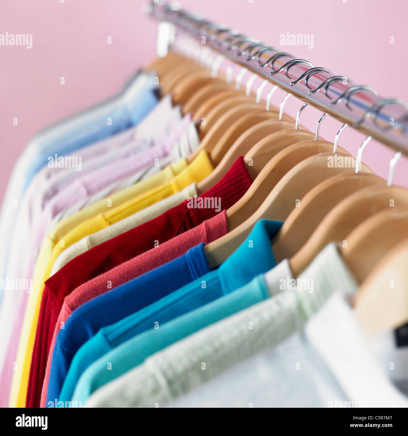 Clothes hanging on hangers Stock Photo Alamy
