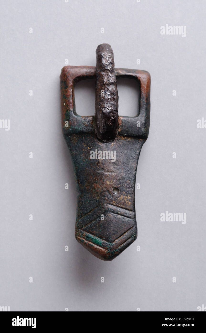 Belt buckle made of bronze . Visigoth period in Complutum . SPAIN Stock Photo