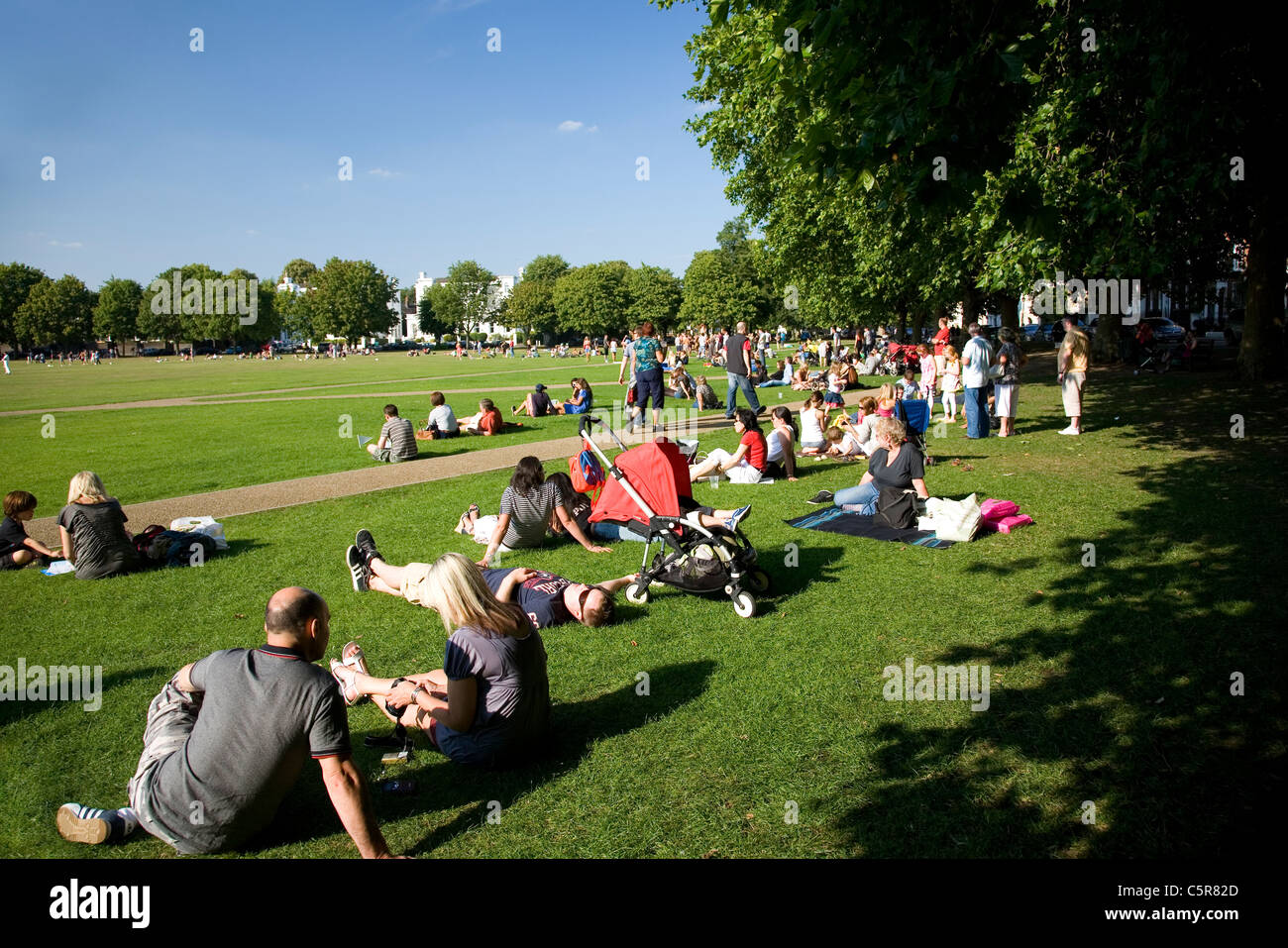 Richmond Green - people relaxing on a summer weekend - UK Stock Photo ...