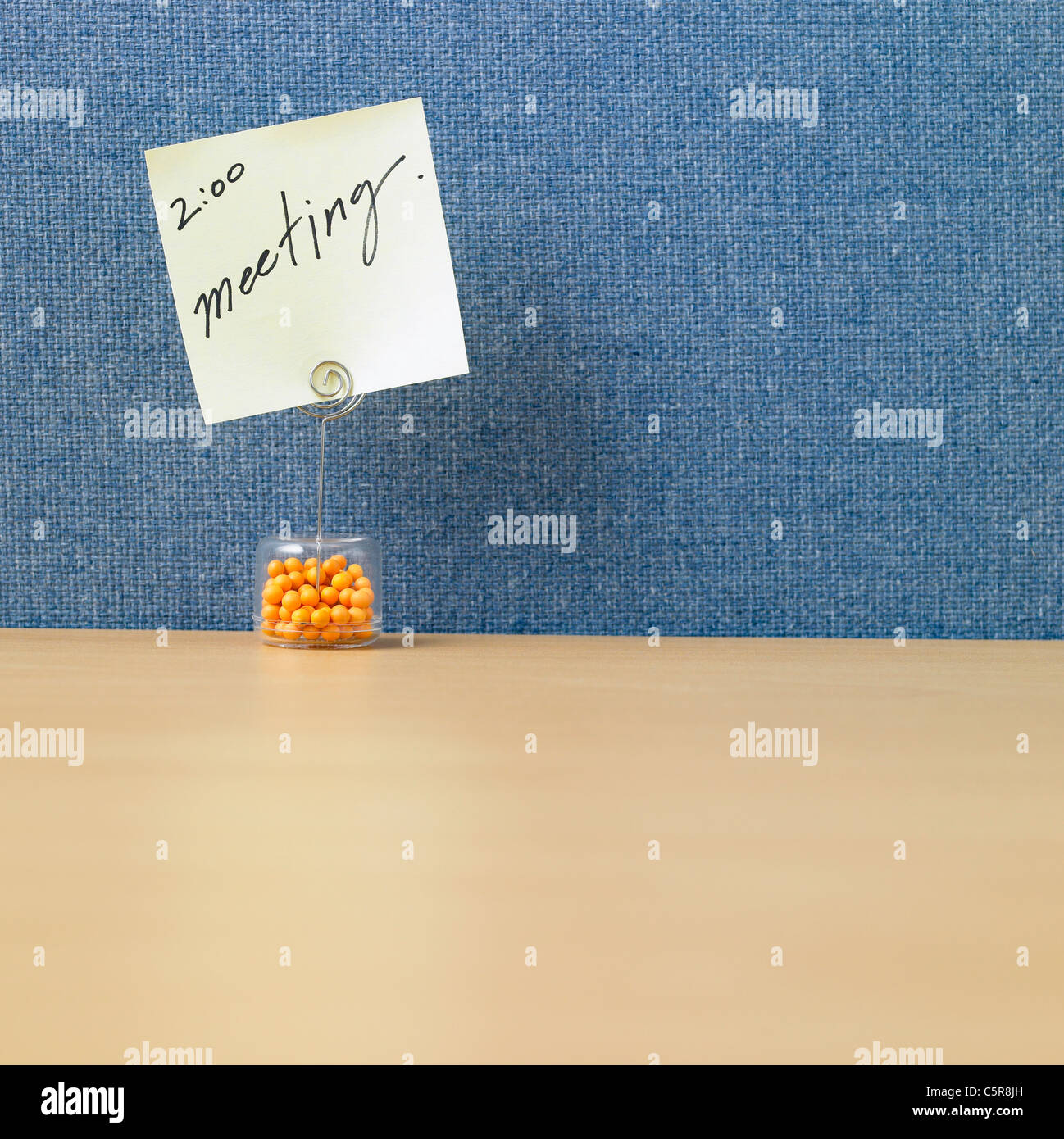 A memo clipped on memo holder Stock Photo
