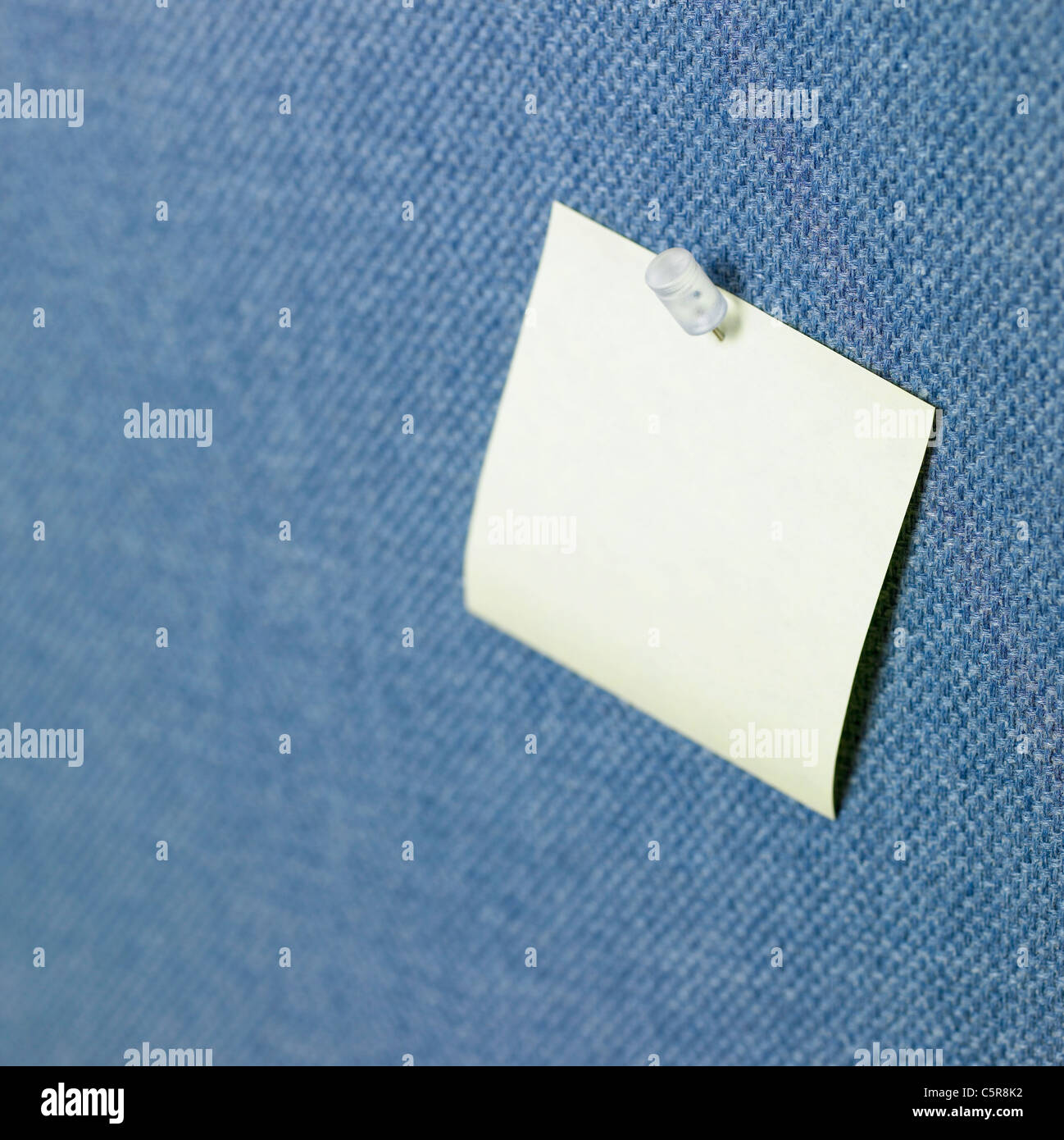A memo pinned on a wall Stock Photo