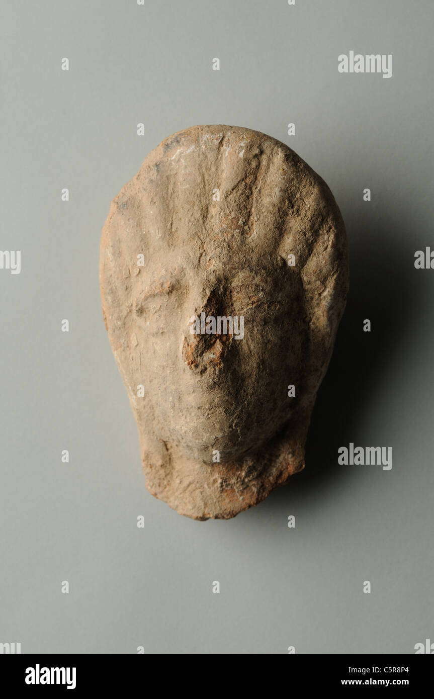 Head female of terracotta. Roman period in Complutum . SPAIN Stock Photo