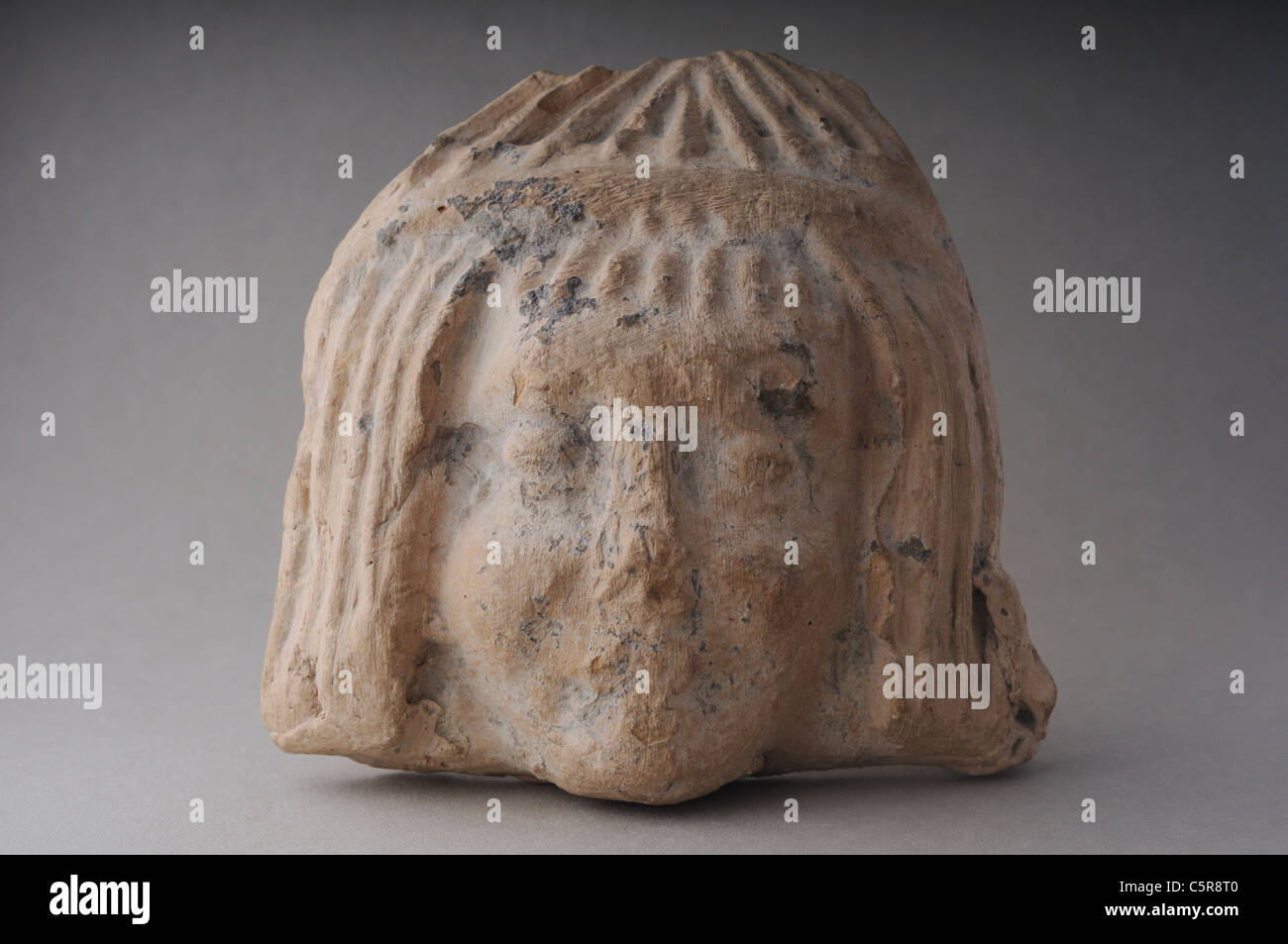 Antefixes of terracotta . Roman period in Complutum . SPAIN Stock Photo