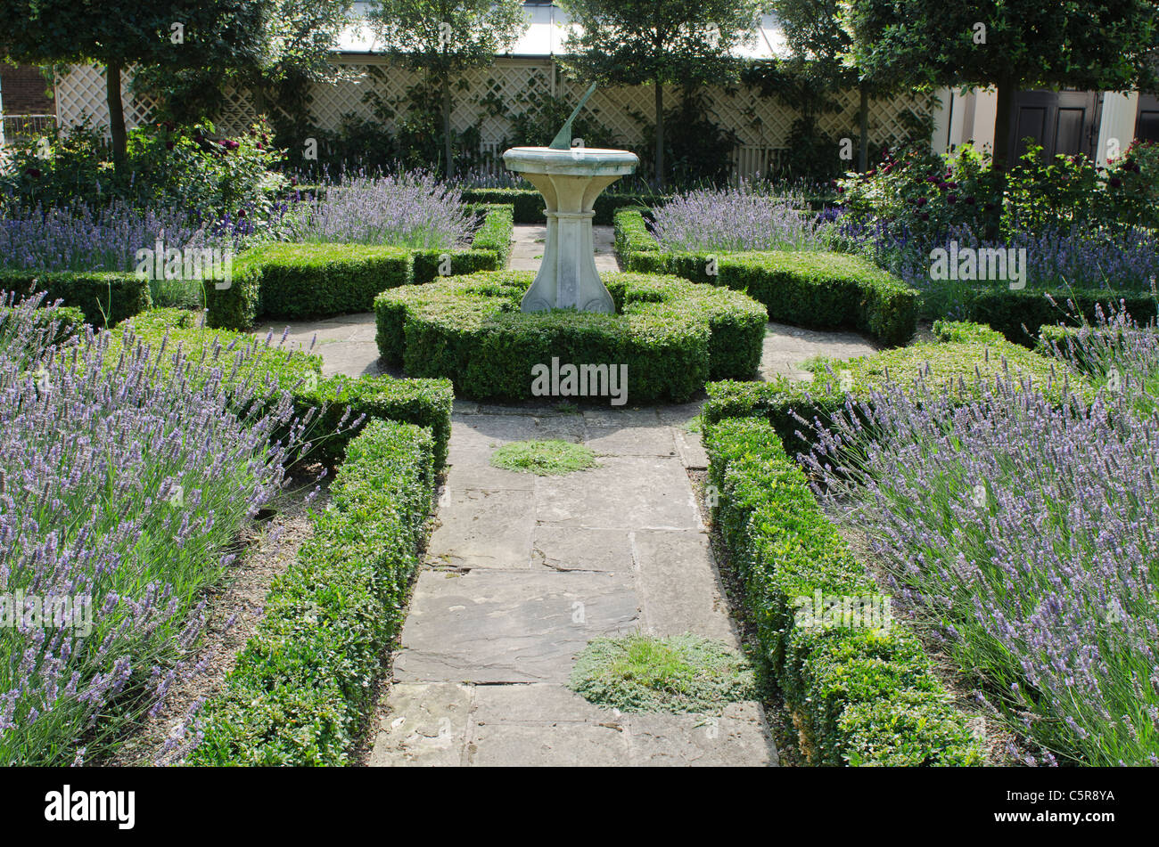 formal garden sun dial lavender box hedges Clarence House garden The Mall Westminster London Uk Stock Photo