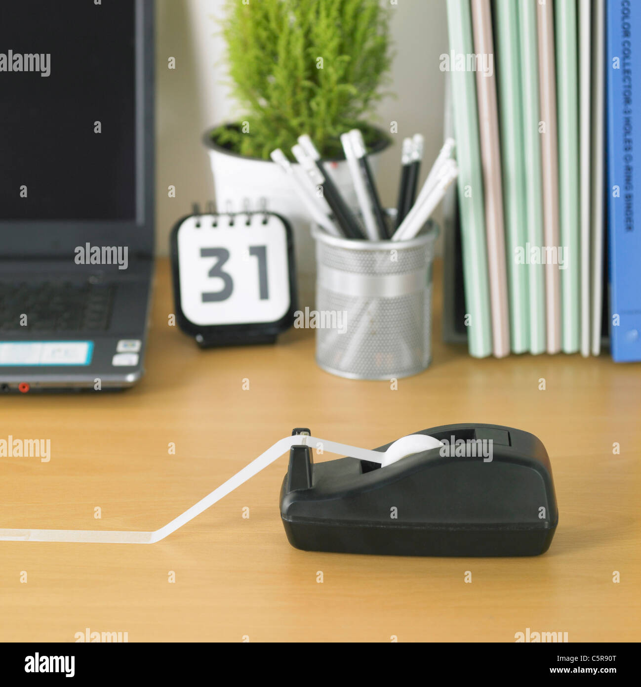 Sticky tape on office desk Stock Photo Alamy