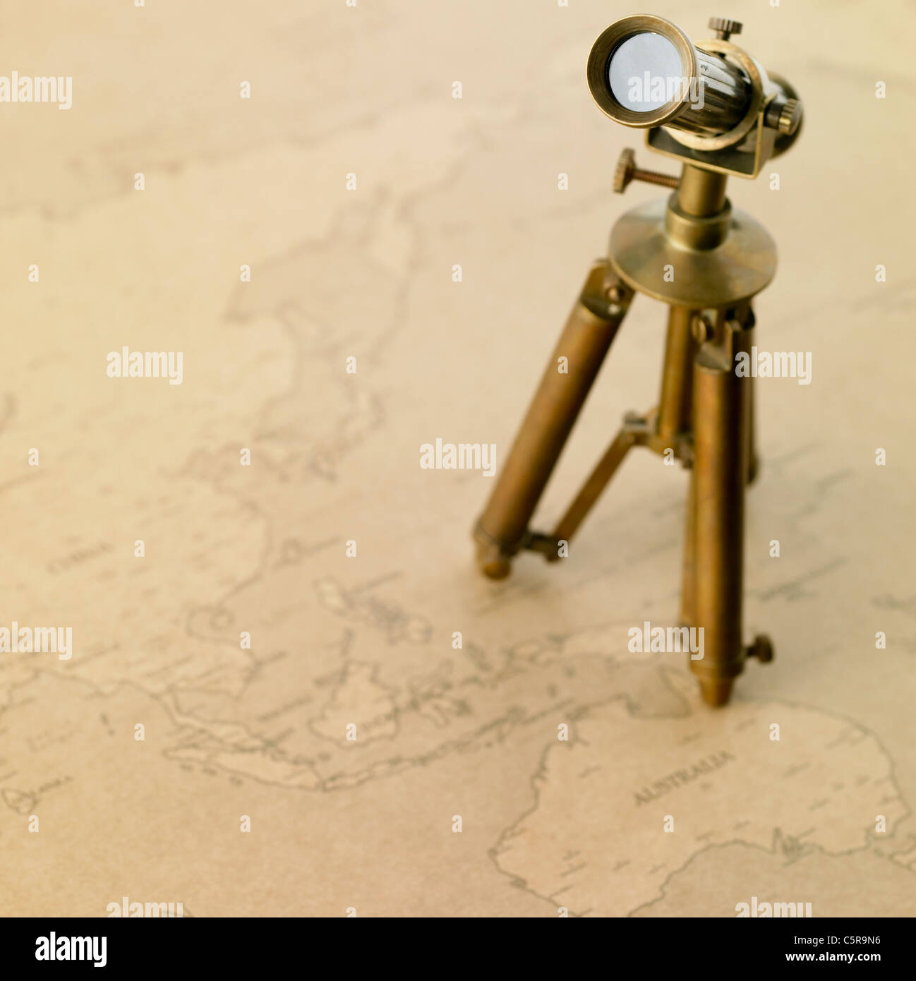 A telescope on a map Stock Photo