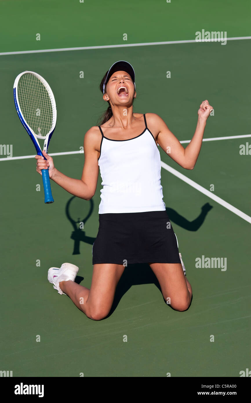 A tennis player celebrates game, set and match Stock Photo Alamy
