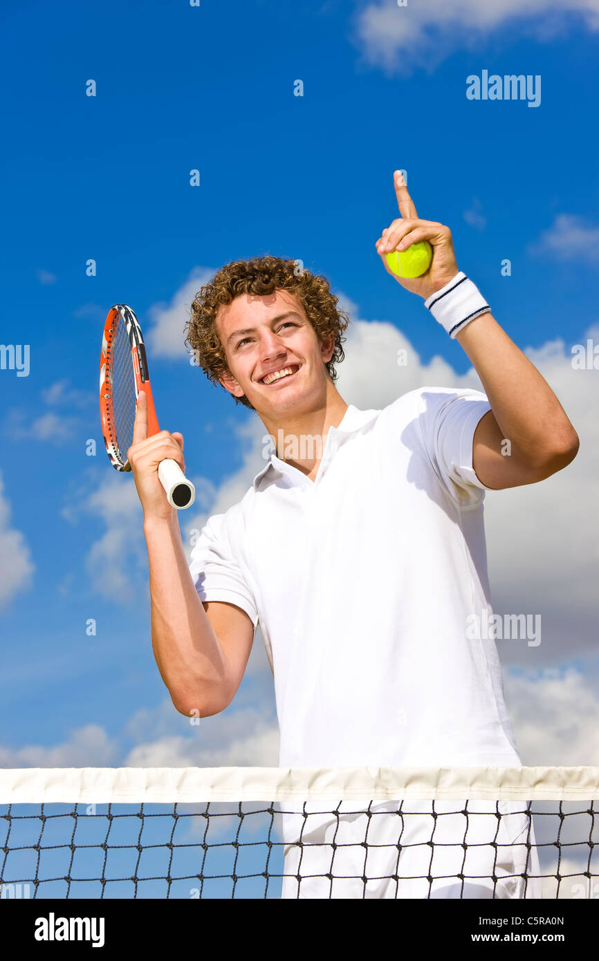A tennis player celebrates being number one. Stock Photo