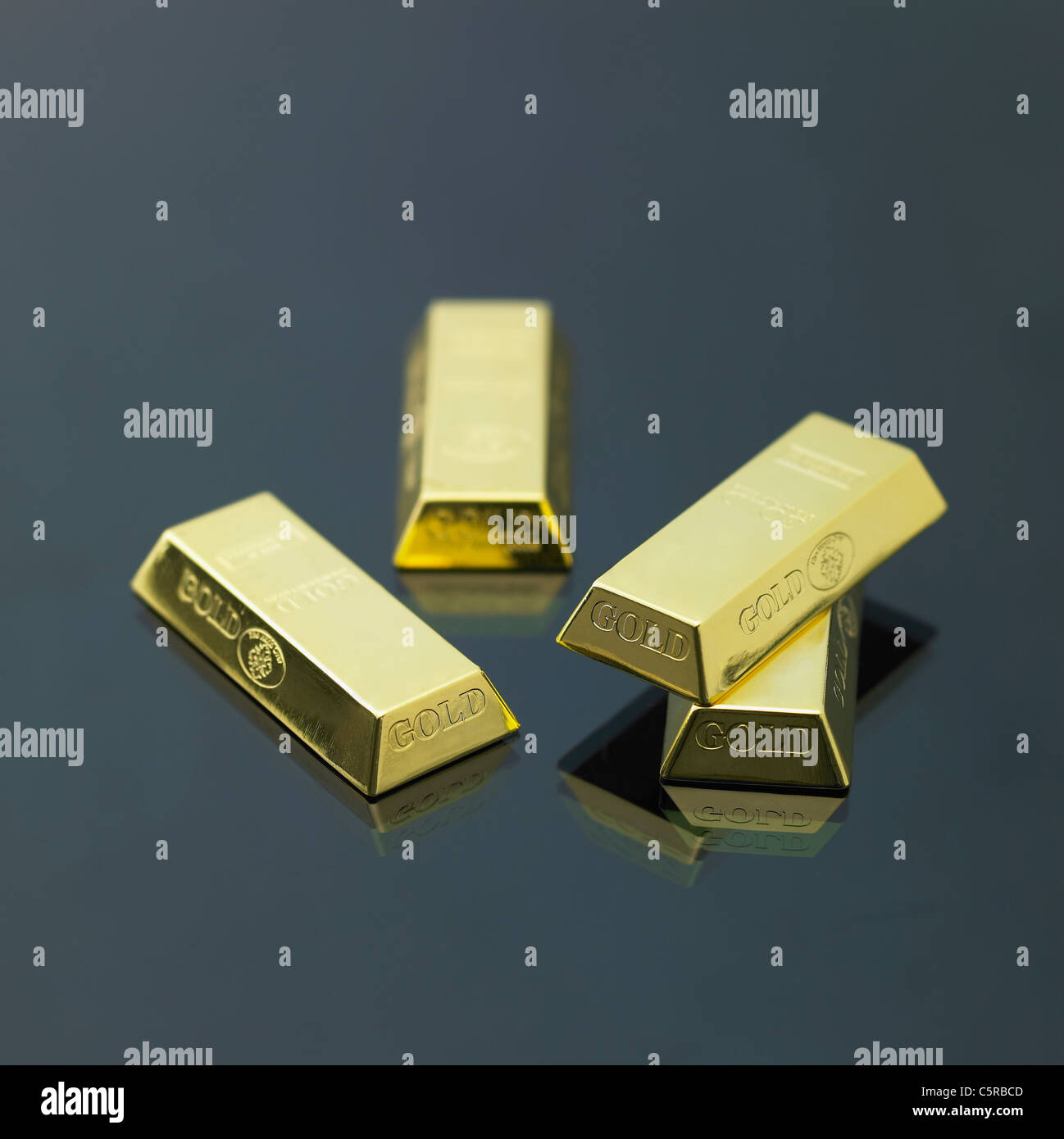 Gold bars scattered Stock Photo