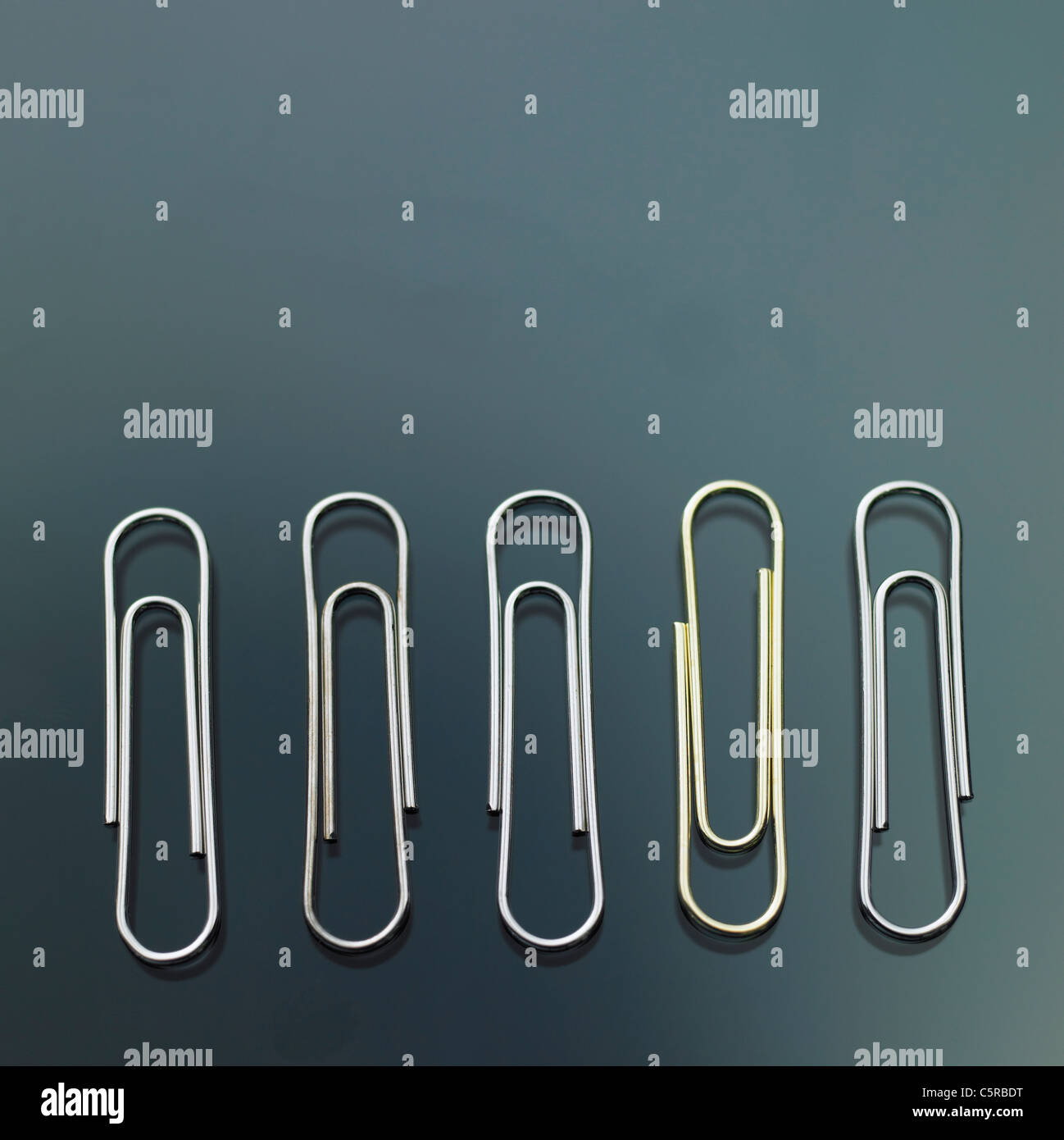 Paper clips in a row Stock Photo