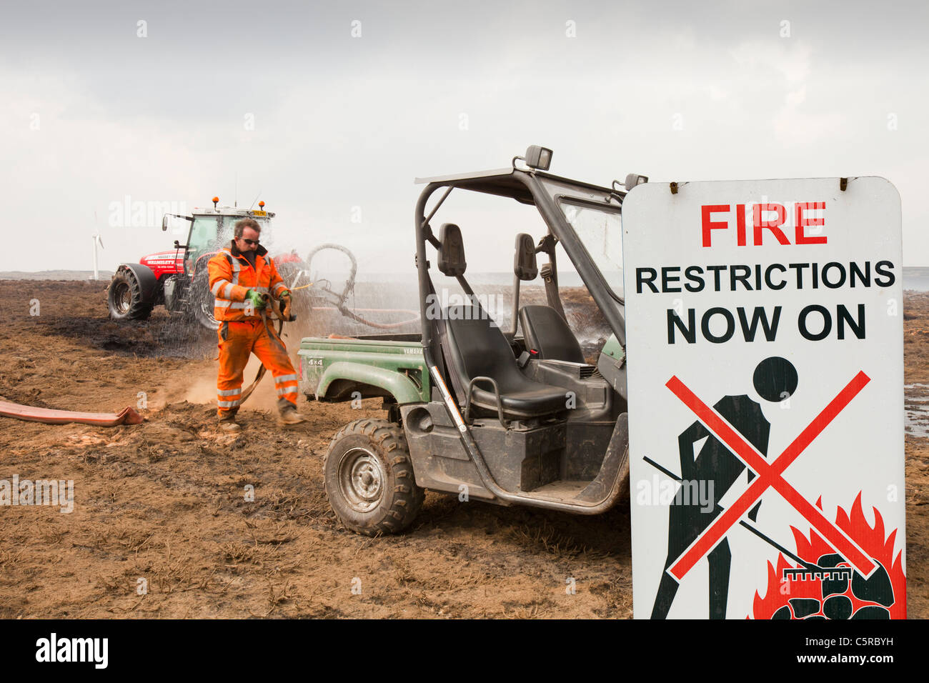 Tackling a moorland fire above Wainstalls near Halifax, UK. Stock Photo