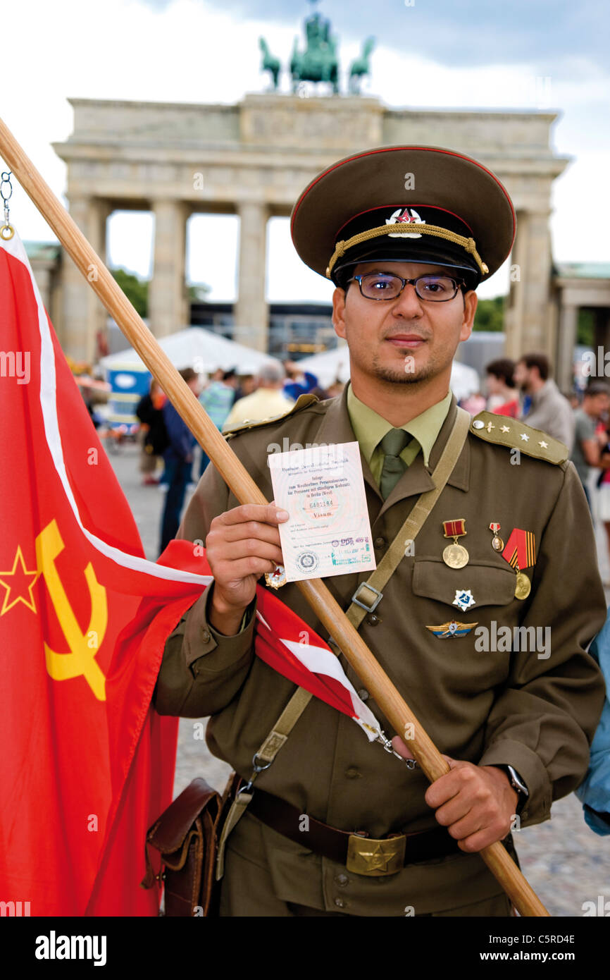 Germany, Berlin, Russian soldier holding transit visa, portrait Stock Photo