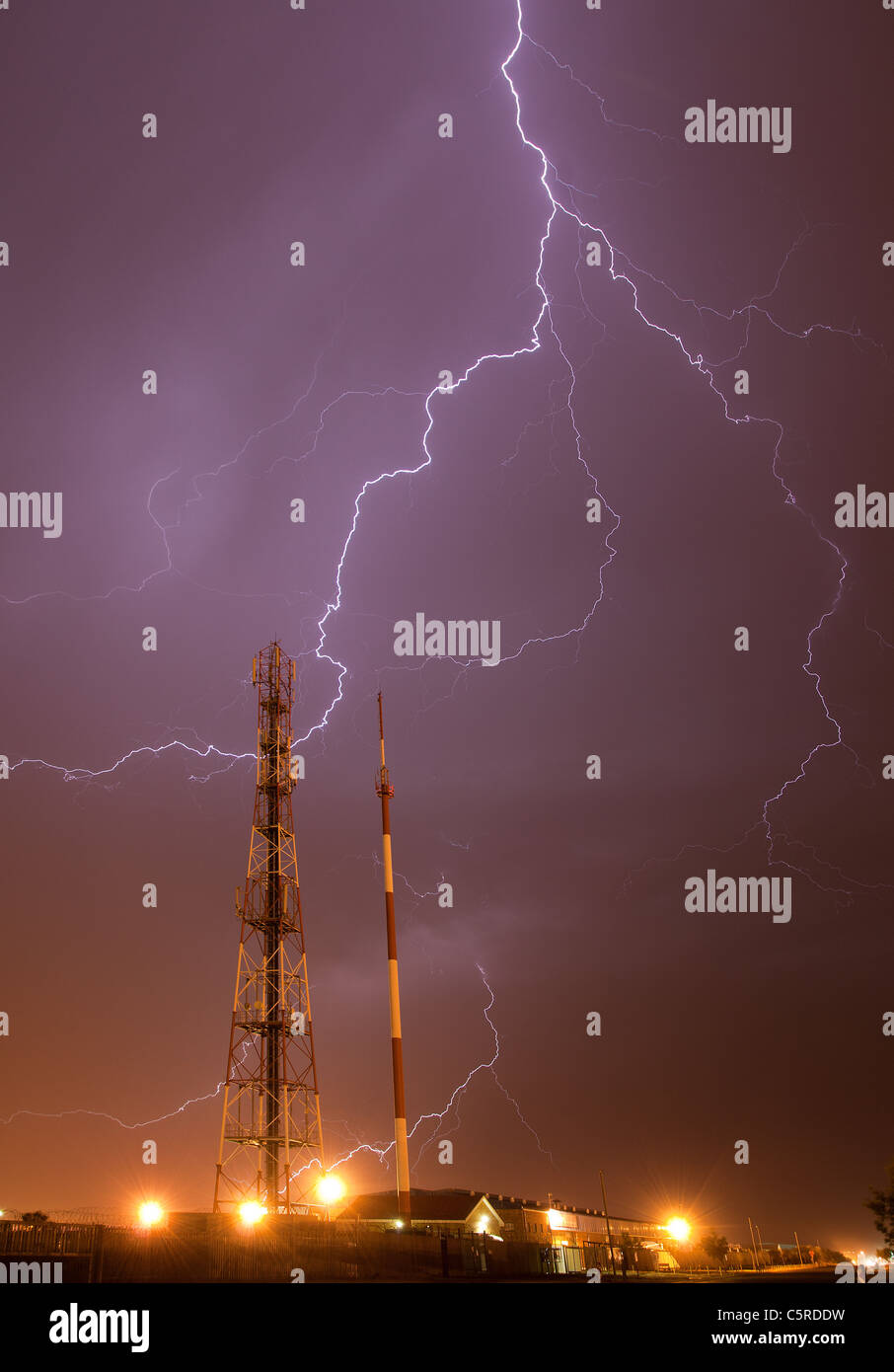 thunder storm with lightning striking the earth Stock Photo