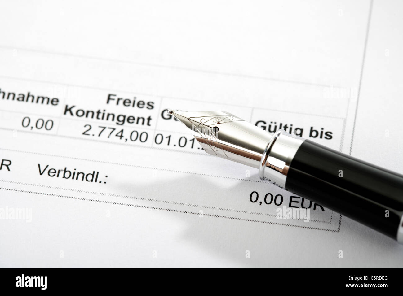 Pen lying on exemption order, close-up Stock Photo