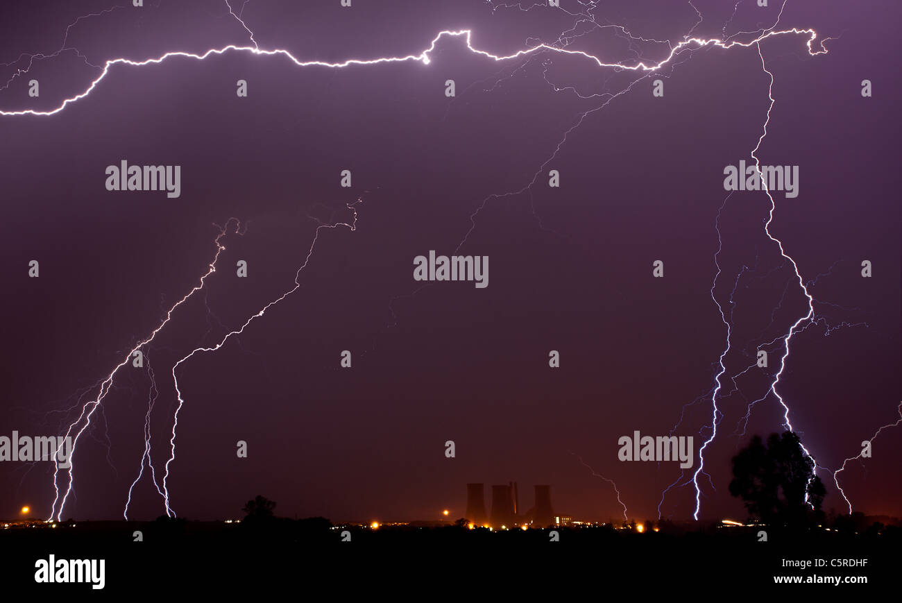 thunder storm with lightning striking the earth Stock Photo Alamy