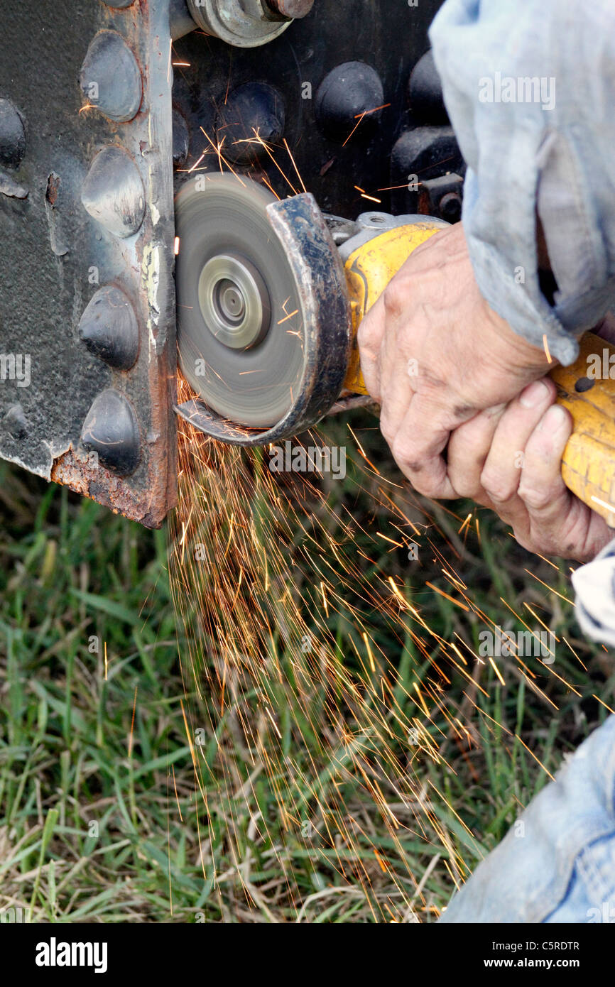 Grinding off a weld Stock Photo Alamy