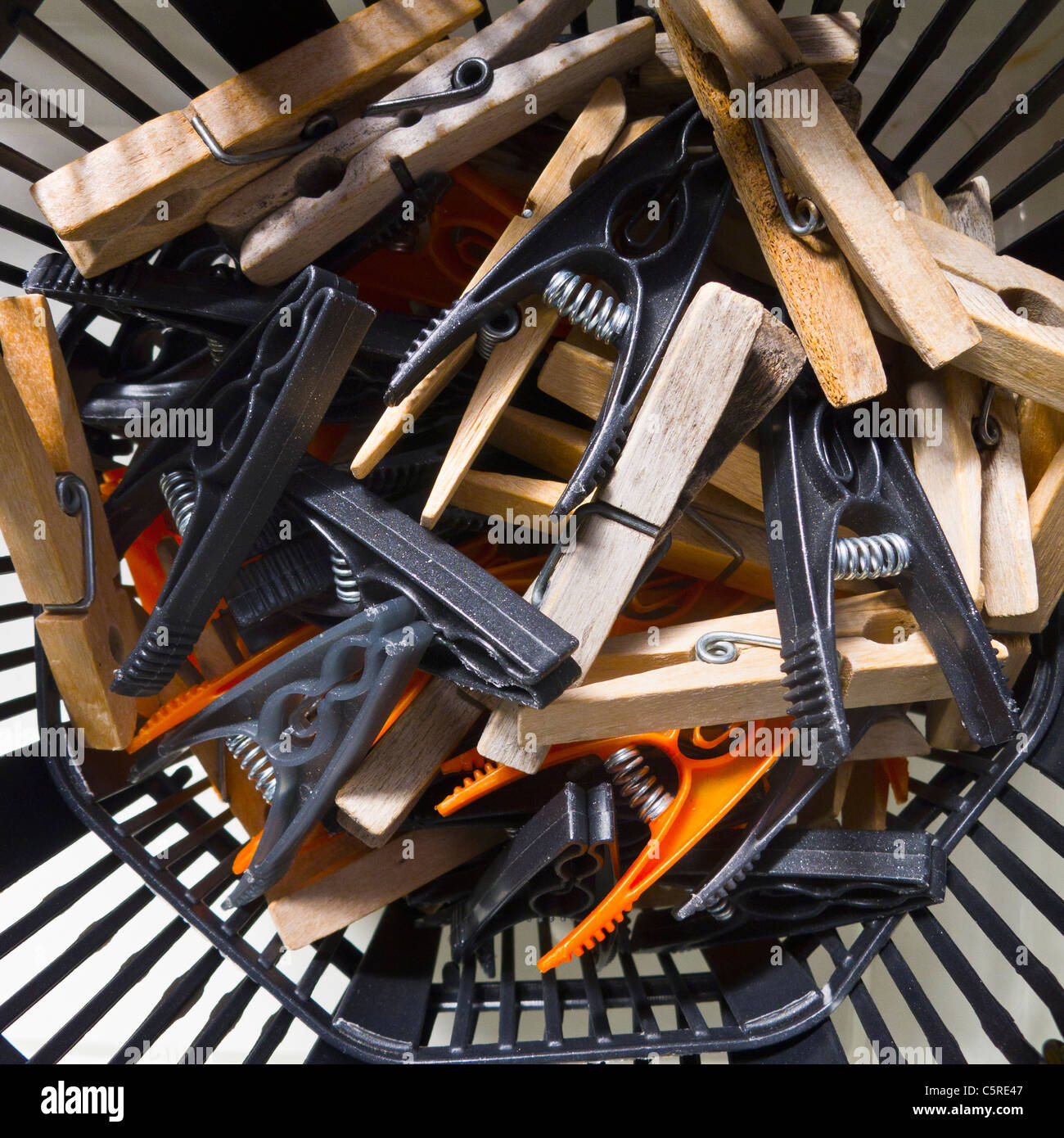 Clothes pegs in a basket Stock Photo Alamy