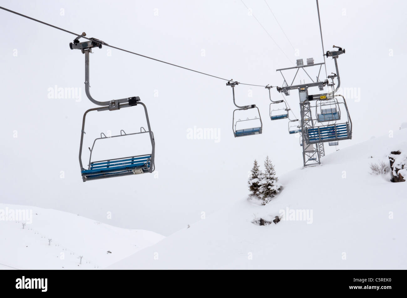 Switzerland, GraubÃ¼nden, Arosa, Empty ski lift chairs Stock Photo