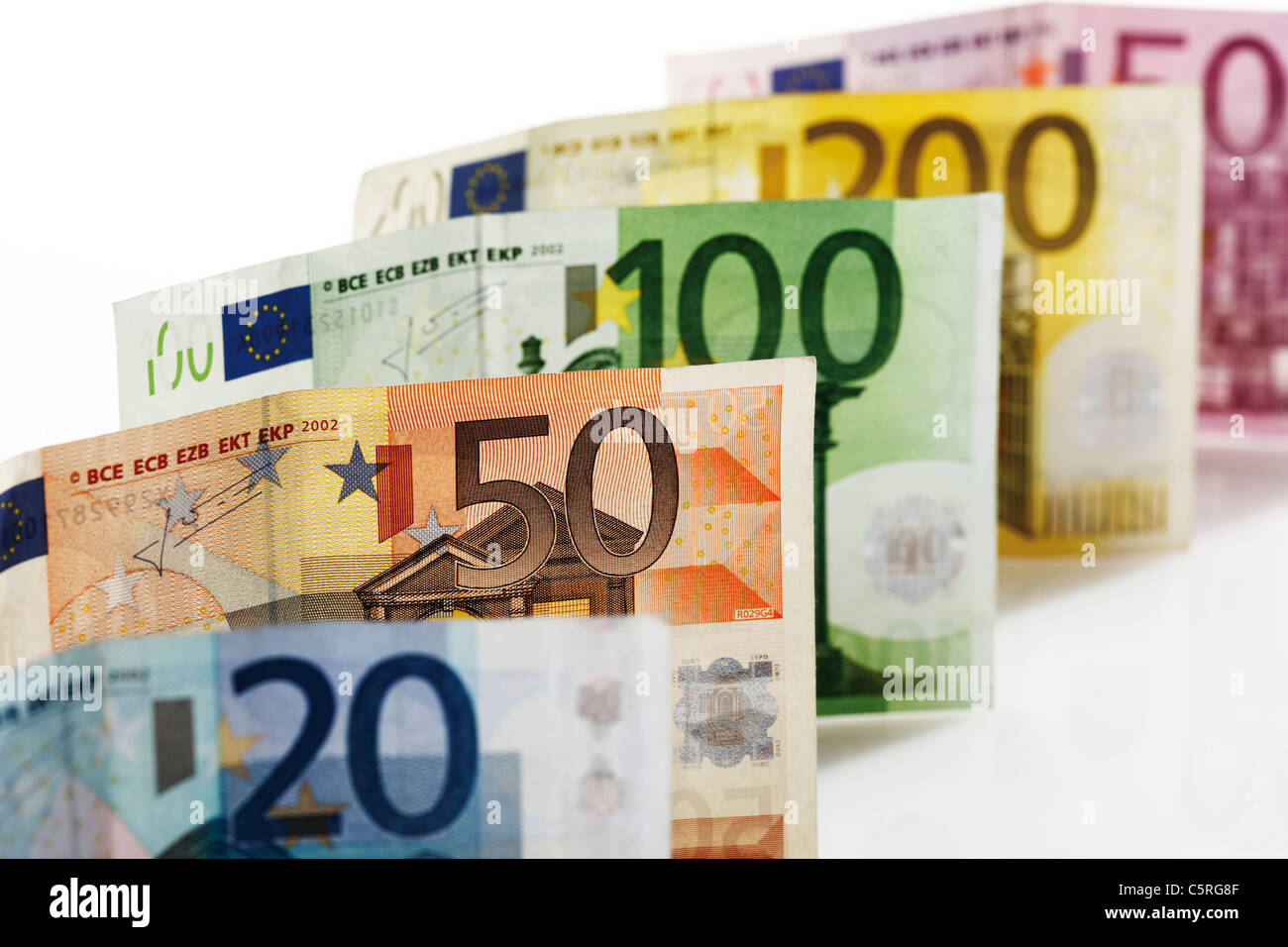 Various Euro bank notes in a row, close-up Stock Photo