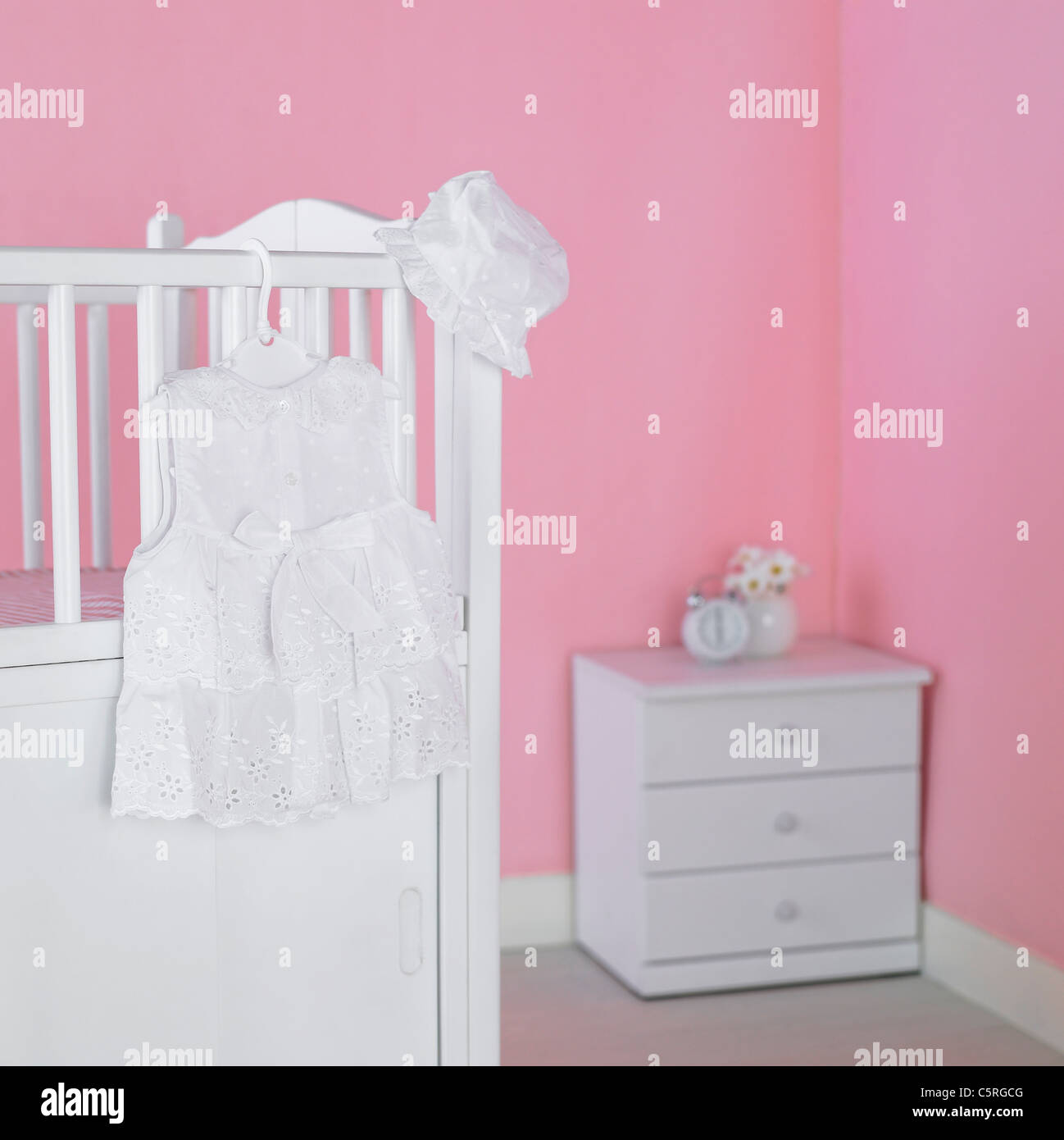 Baby's clothes on a cradle Stock Photo Alamy
