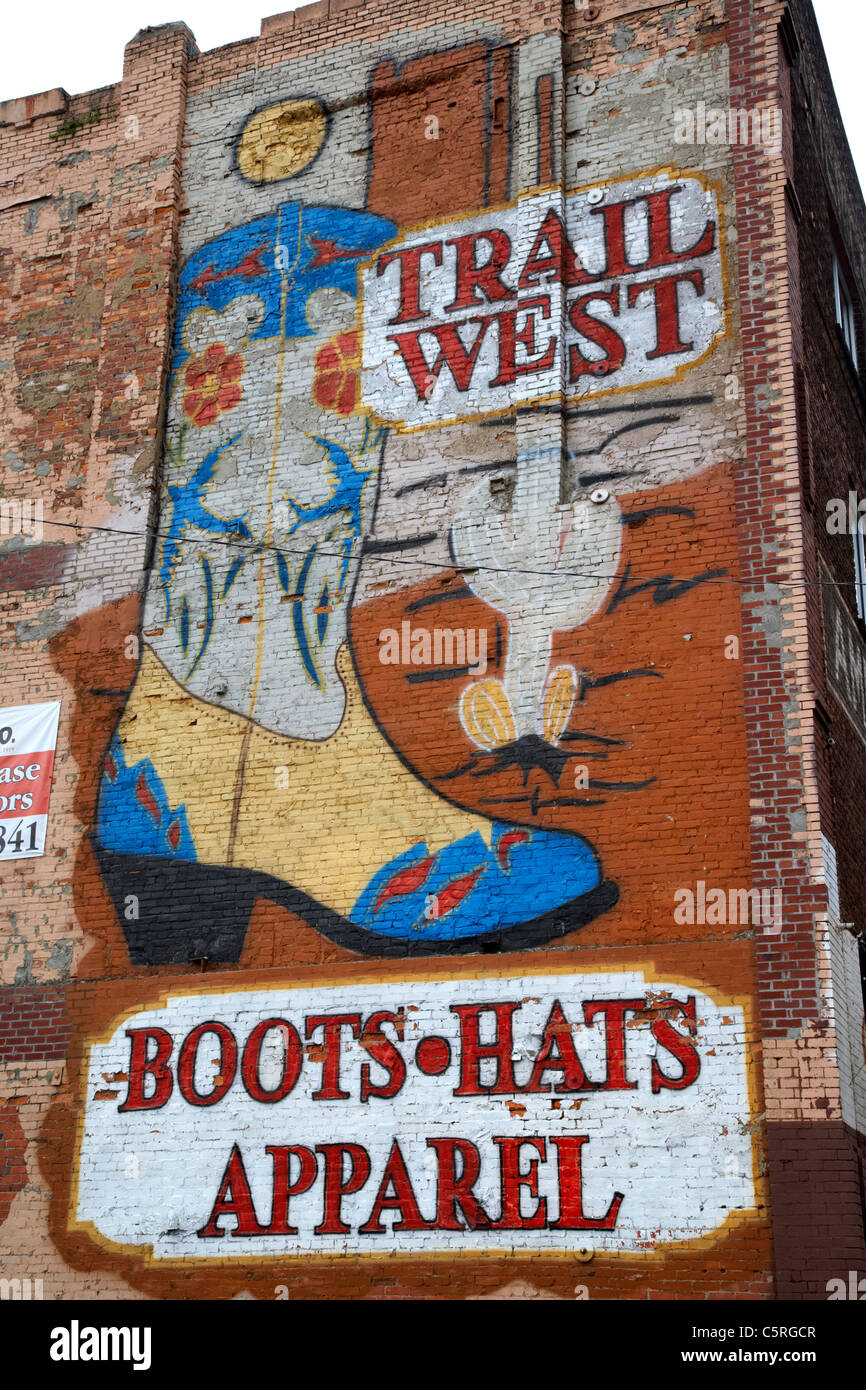 trail west painted wall mural advert for cowboy boots hats and apparel