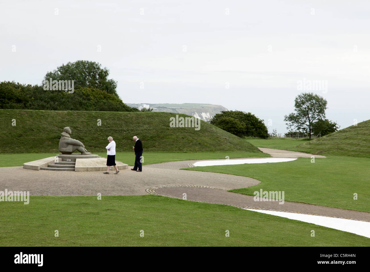 Couple visiting Battle of Britain Memorial CapelleFerne Kent Stock