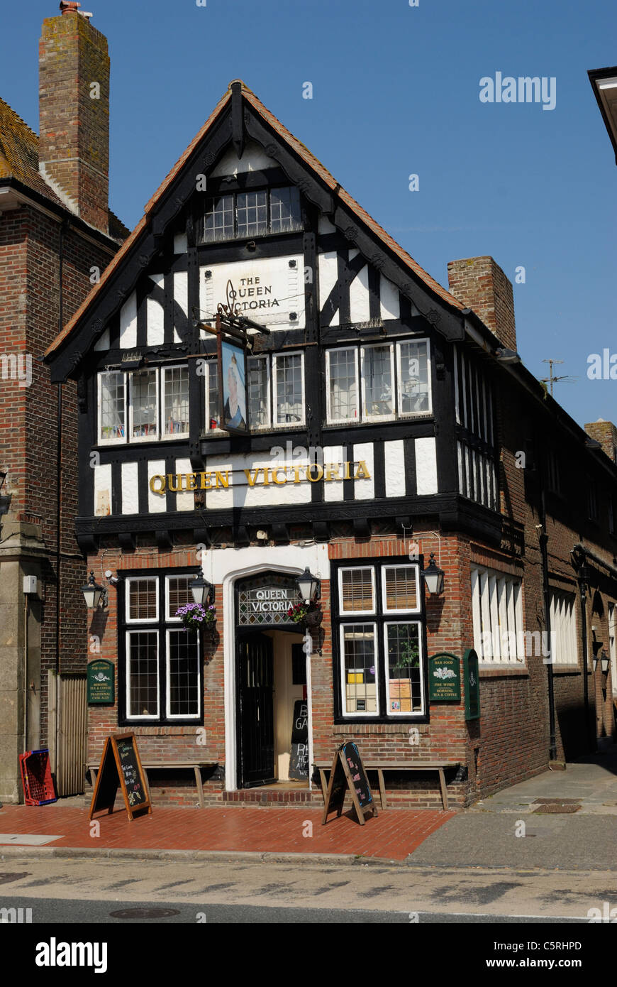 The Queen Victoria public house in the High Street at Rottingdean, East Sussex, England. Stock Photo