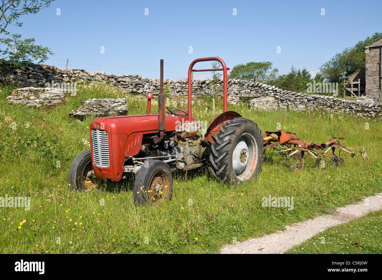 Massey Ferguson 35 tractor photographed on a hill farm in the Yorkshire Dales. Stock Photo