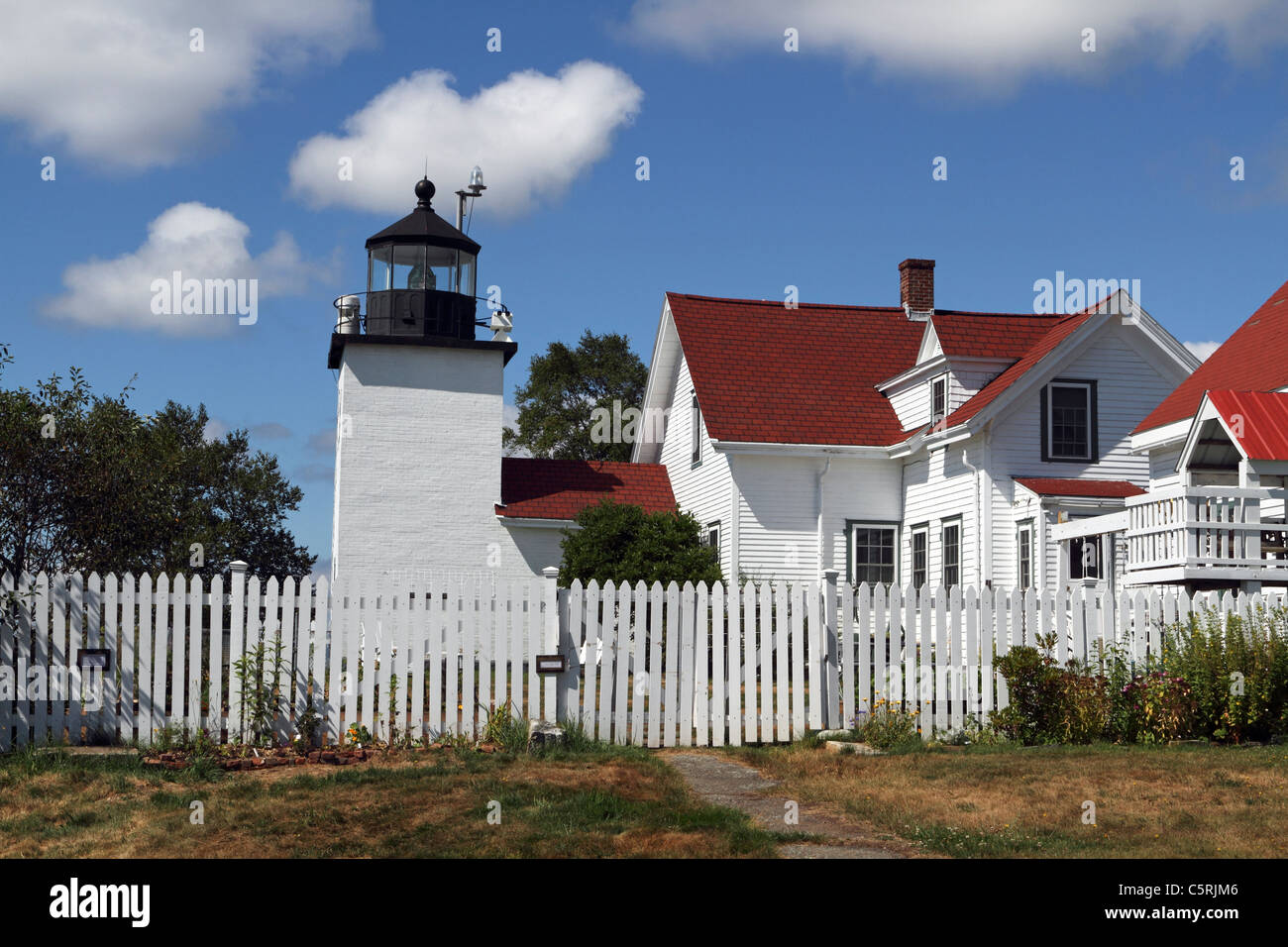 Fort Point Lighthouse in Fort Point Light State Park, Maine, USA. The lighthouse is on Penobscot Bay. Stock Photo